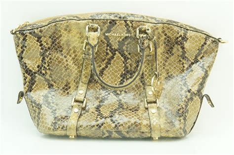 michael kors clutch schlangenoptik|Michael Kors clutch handbags.